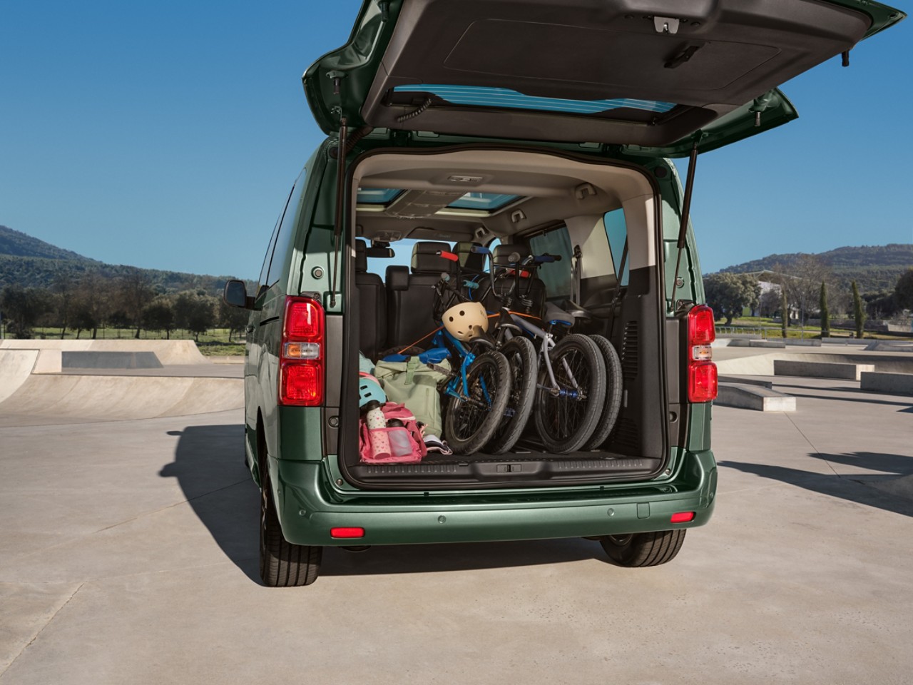 A Proace Verso loaded with bikes and luggage