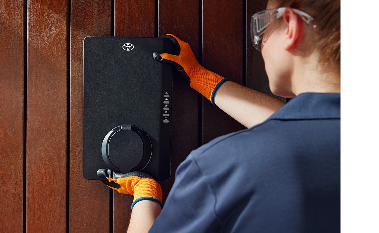 Person installing a Toyota Homecharge