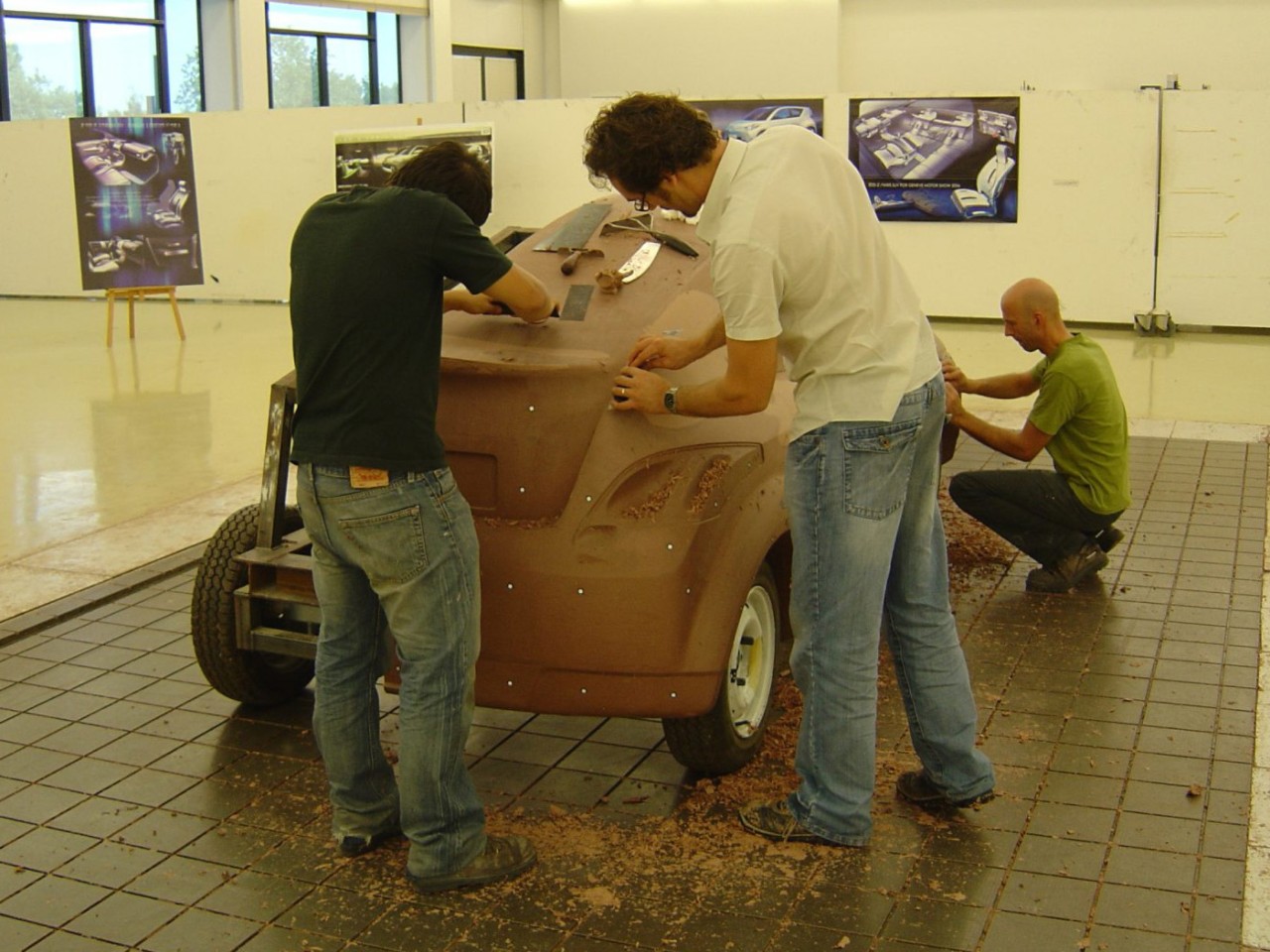 Inside Toyota ED2 facility, people working on a model car