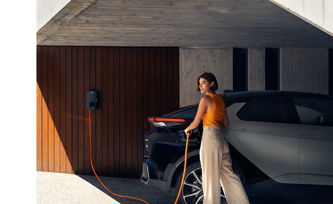 Person using Toyota HomeCharge to charge up their Toyota C-HR