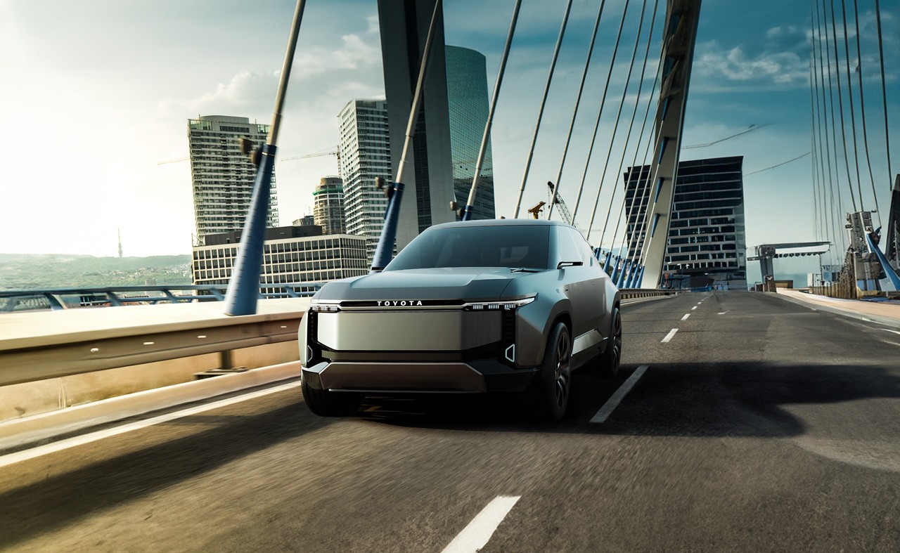 Toyota Land Cruiser Se driving across a bridge in a city